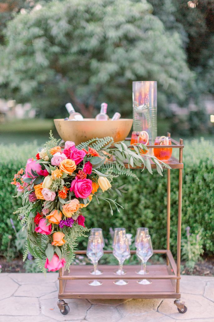 Bright and bold wedding bar cart by CH&LER